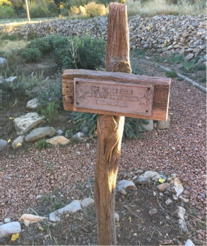 old fence post road sign
