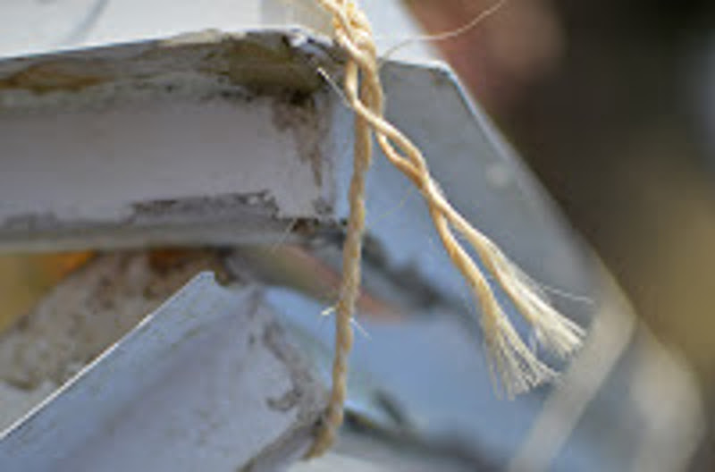 wire securing windows against wind